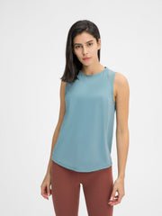Mesh-back performance tank top in teal with a round neckline and sleeveless cut.