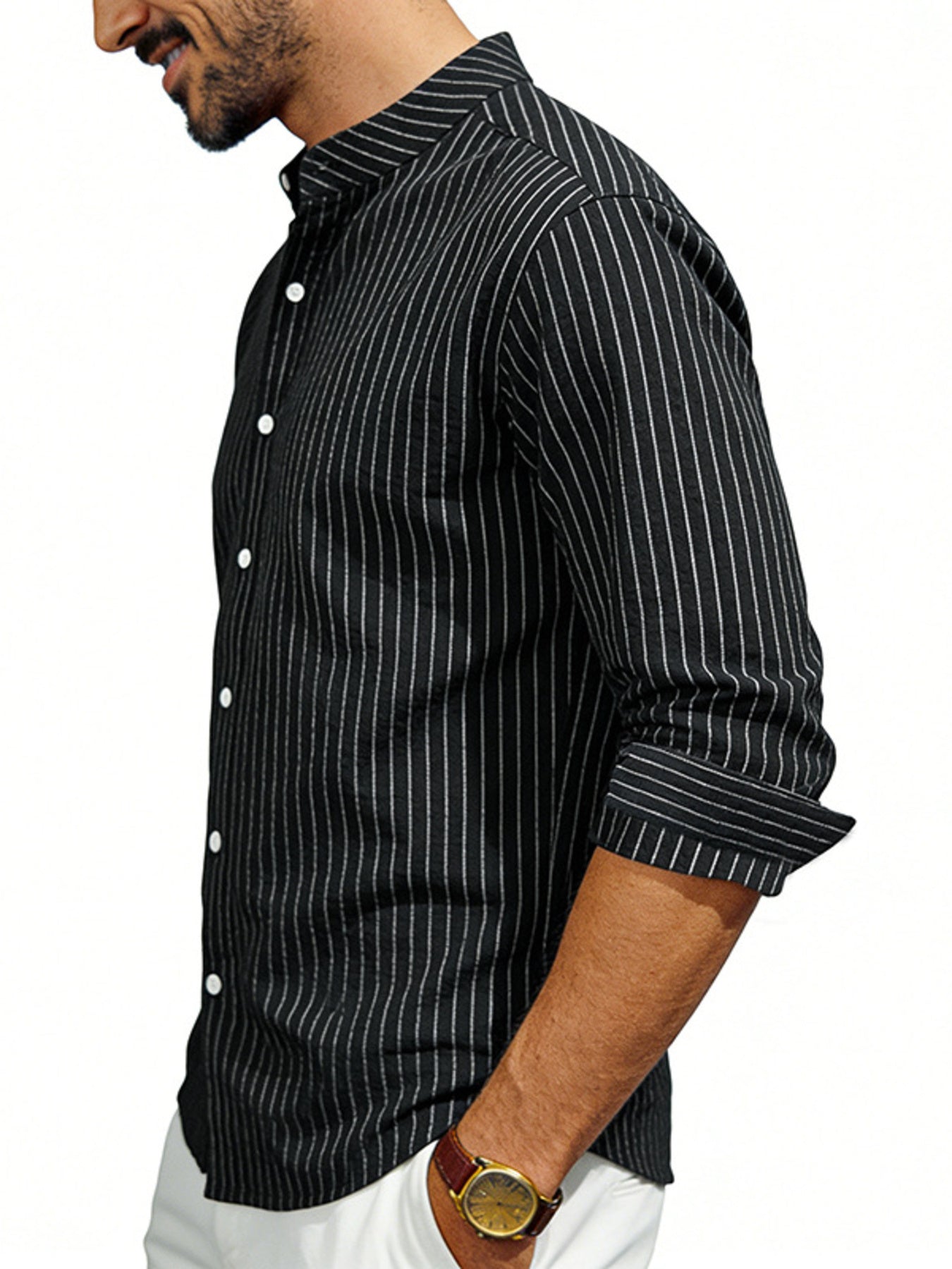 Black pinstripe long sleeve men's shirt with buttoned front and rolled cuffs.
