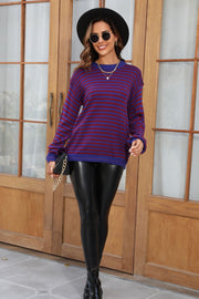 Classic Breton stripe knit crewneck sweater in dark blue and burgundy acrylic with crewneck.