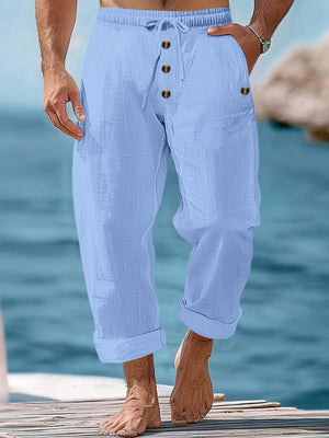 Light blue relaxed fit drawstring sweatpants with button fly and cuffed hems