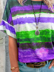 Casual t-shirt with brushstroke stripes in purple, green, and white.