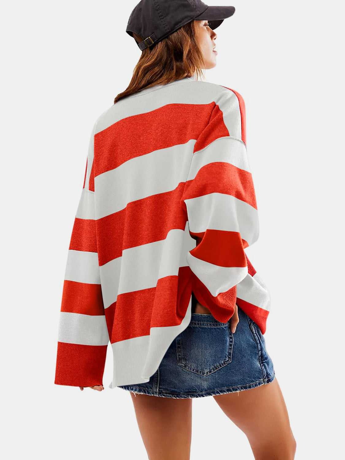 Oversized zip-up pullover with bold orange-red and white stripes, acrylic knit.