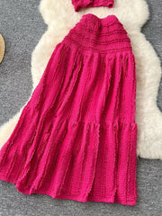 Textured rose red two-piece set with ruffled details and smocked bodice.