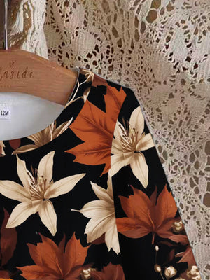 Baby dress with autumn leaves print, black, 100% polyester, long sleeve