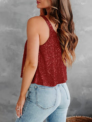 Burgundy sequin-embellished flounce tank top with spaghetti straps.