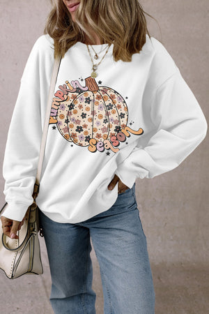 White crewneck sweatshirt with a floral pumpkin graphic and "Pumpkin Season" text.
