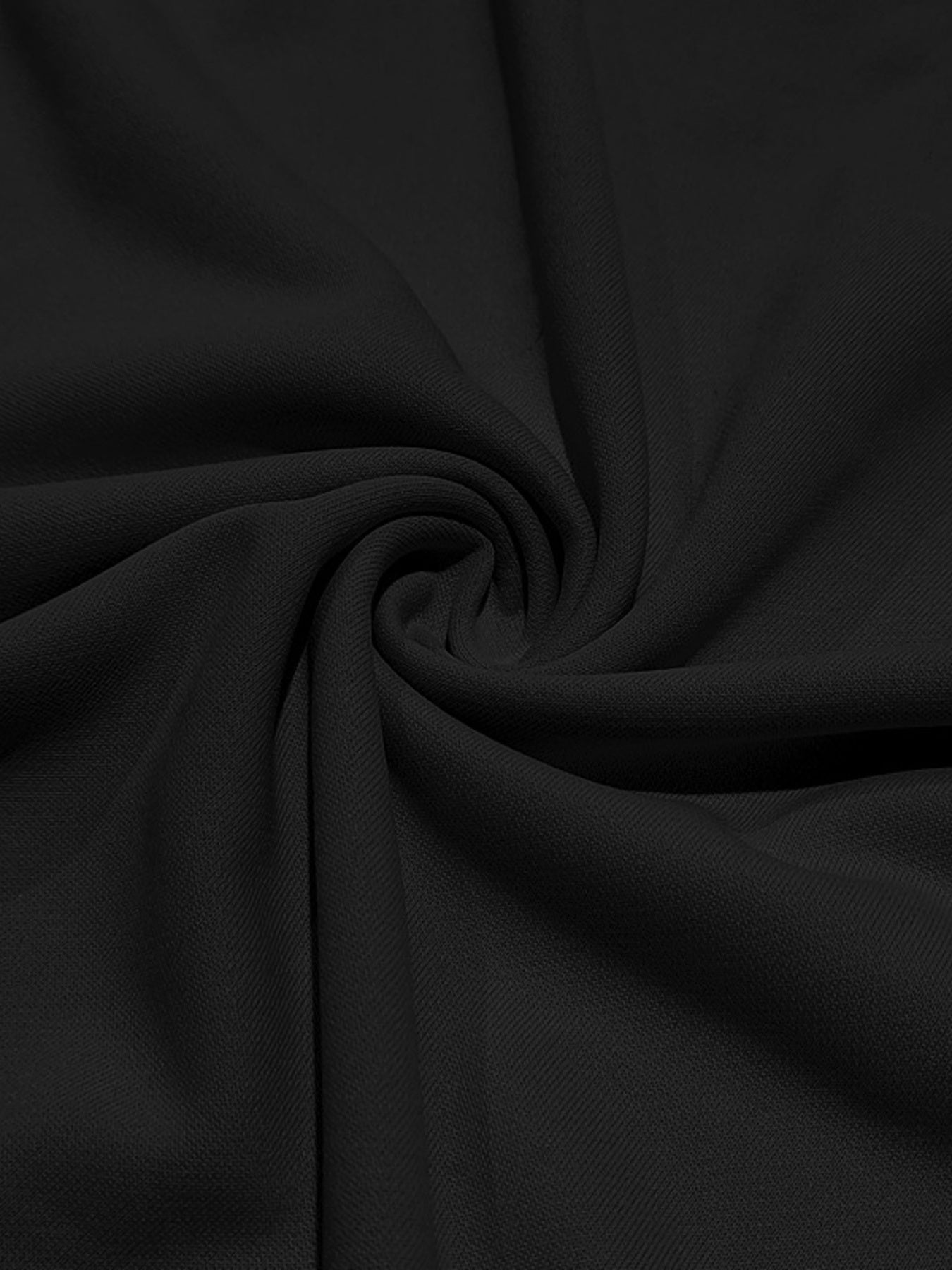 Black cotton t-shirt fabric with a subtle texture, shown in a draped swirl.
