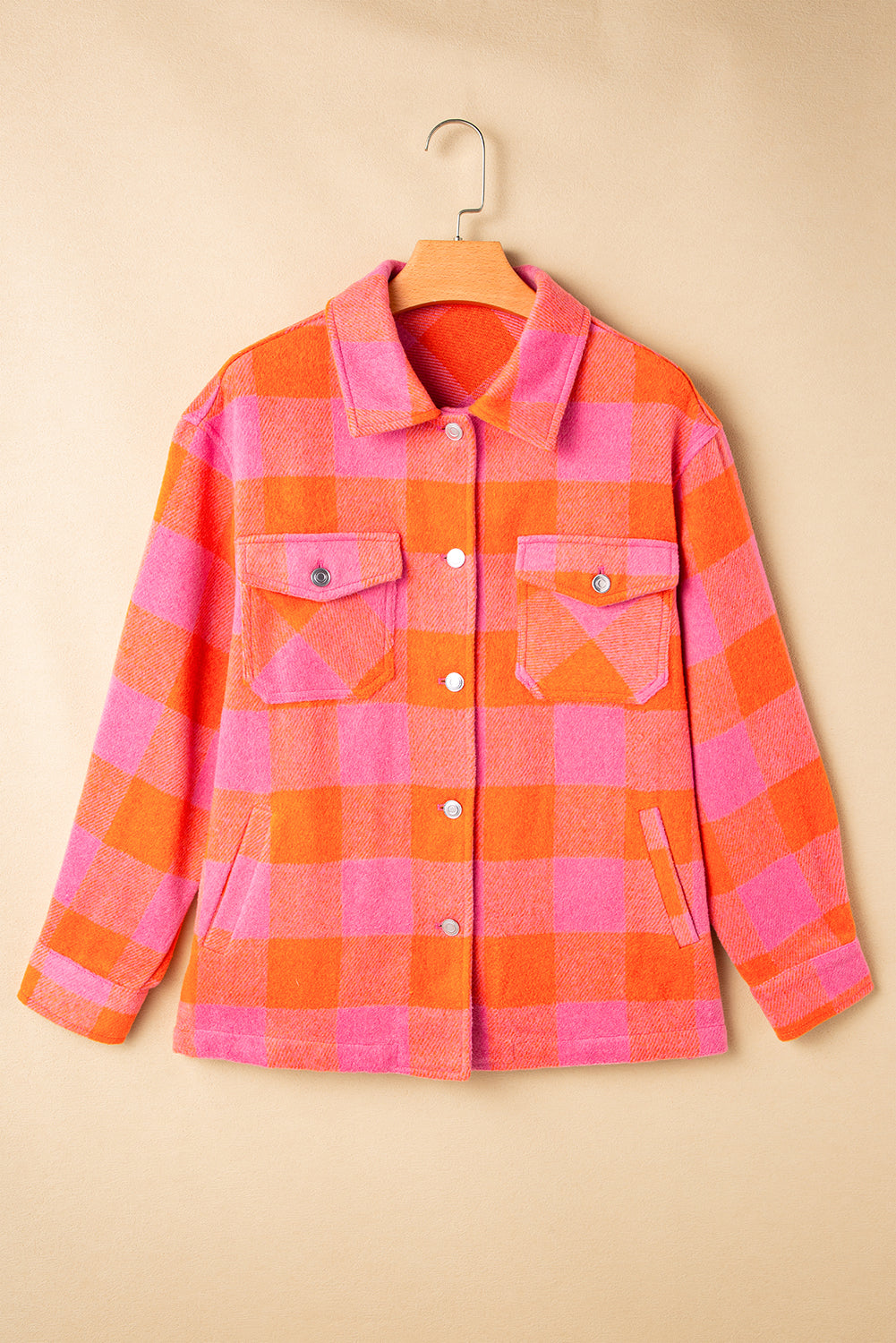 Overshirt in orange and pink buffalo check with button front and patch pockets.