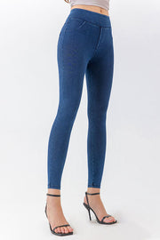 Sculpted denim-effect leggings in medium blue with a high waist and faux pockets.