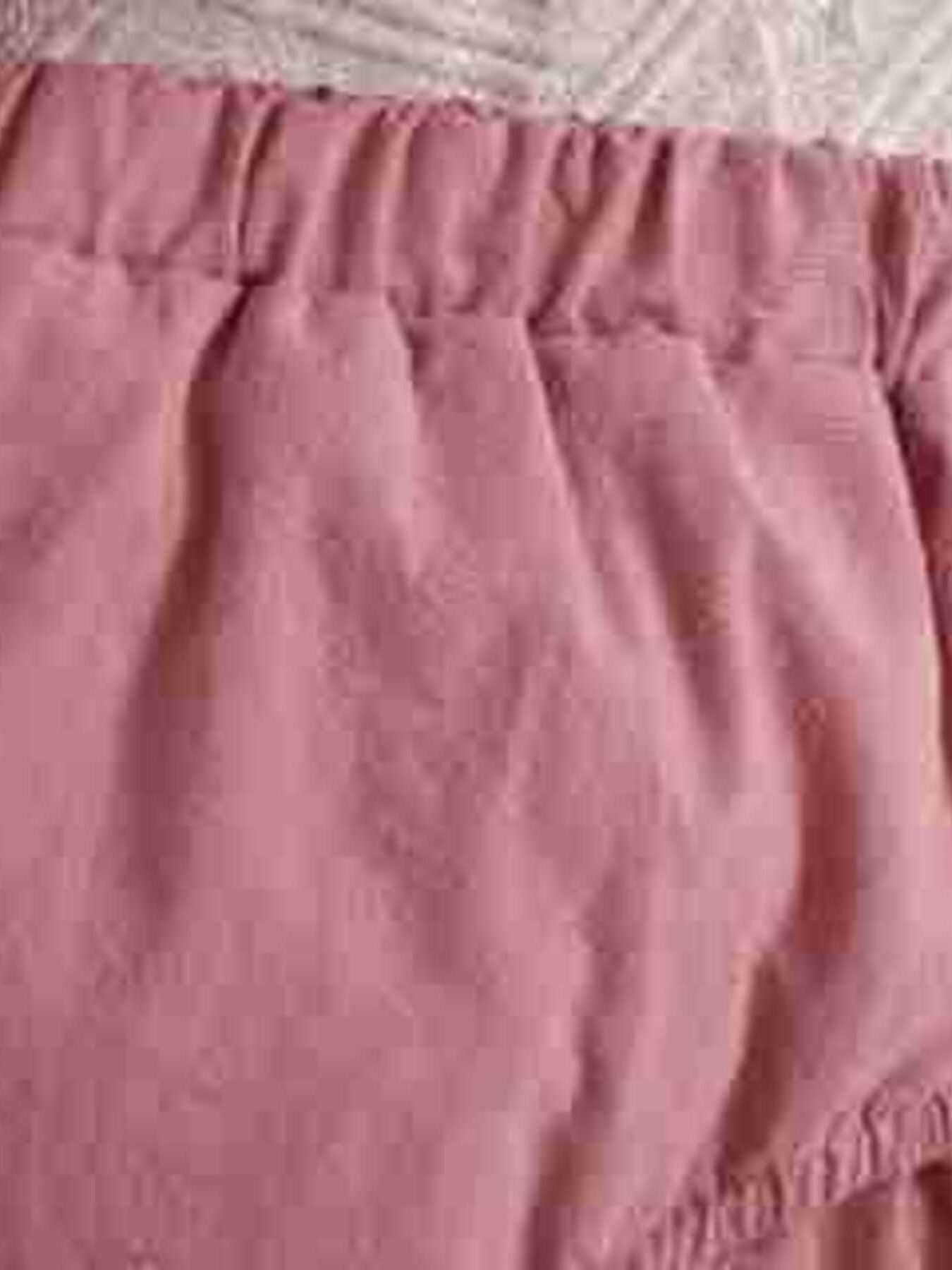 Pink baby set with ruffle trim and button detail