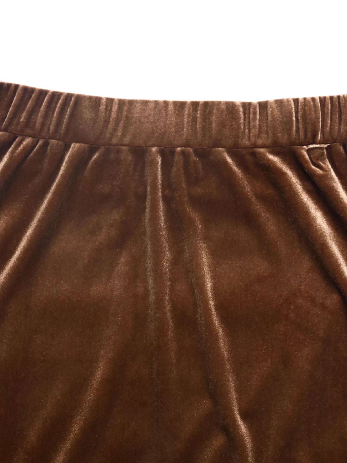 Brown velvet midi skirt with an elastic waistband and tiered detail.