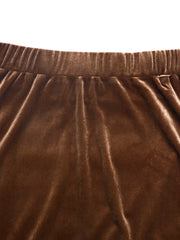 Brown velvet midi skirt with an elastic waistband and tiered detail.