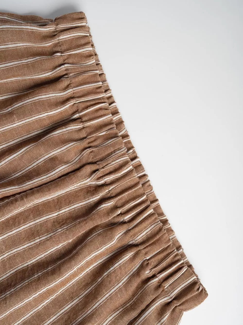 Chic striped two-piece set with tie front in camel.