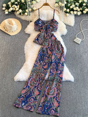 Paisley print cami and wide-leg pant set in indigo with a knotted front detail.