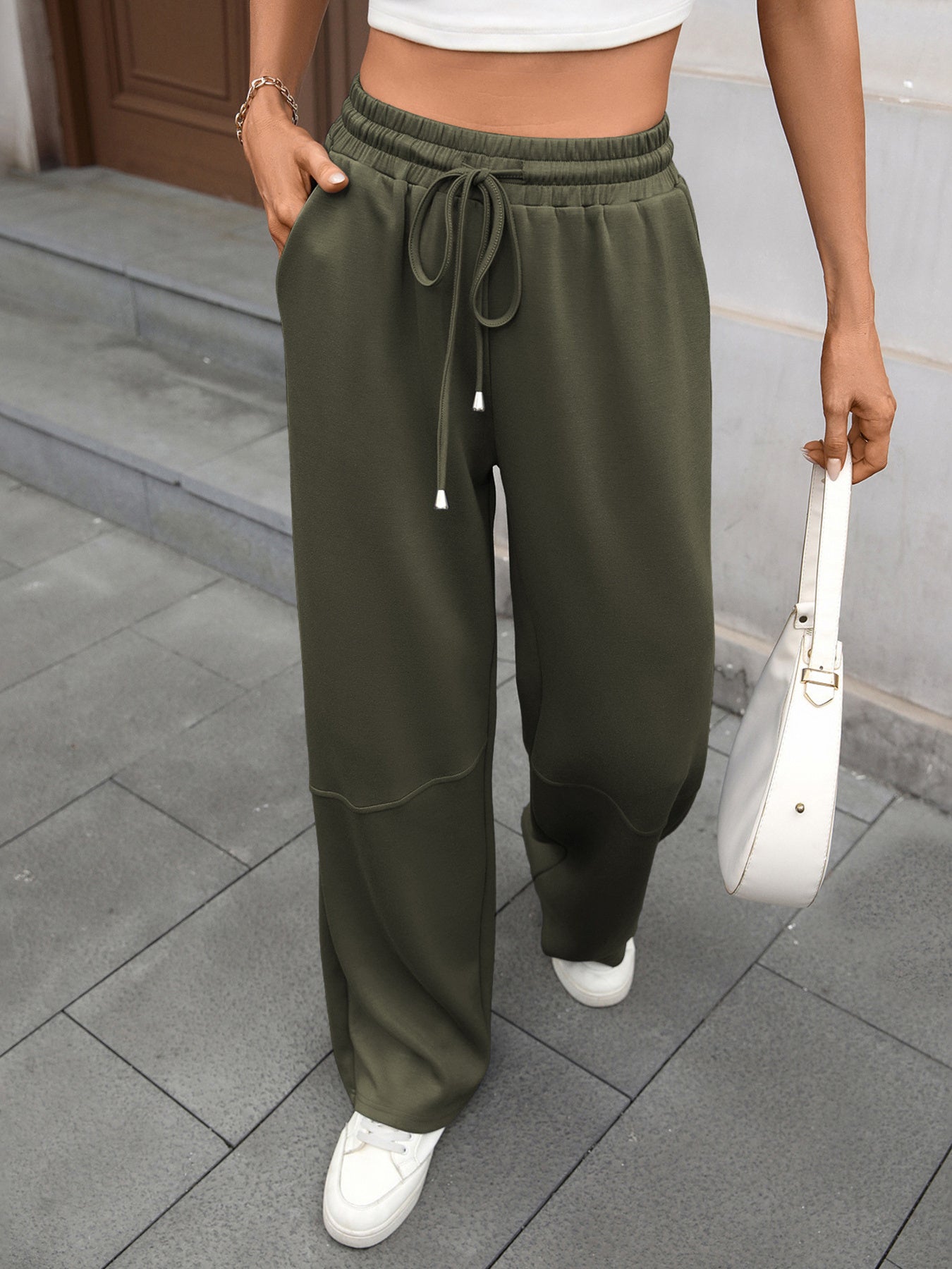 High-waist drawstring wide-leg pants in Army Green with pockets and a relaxed fit.