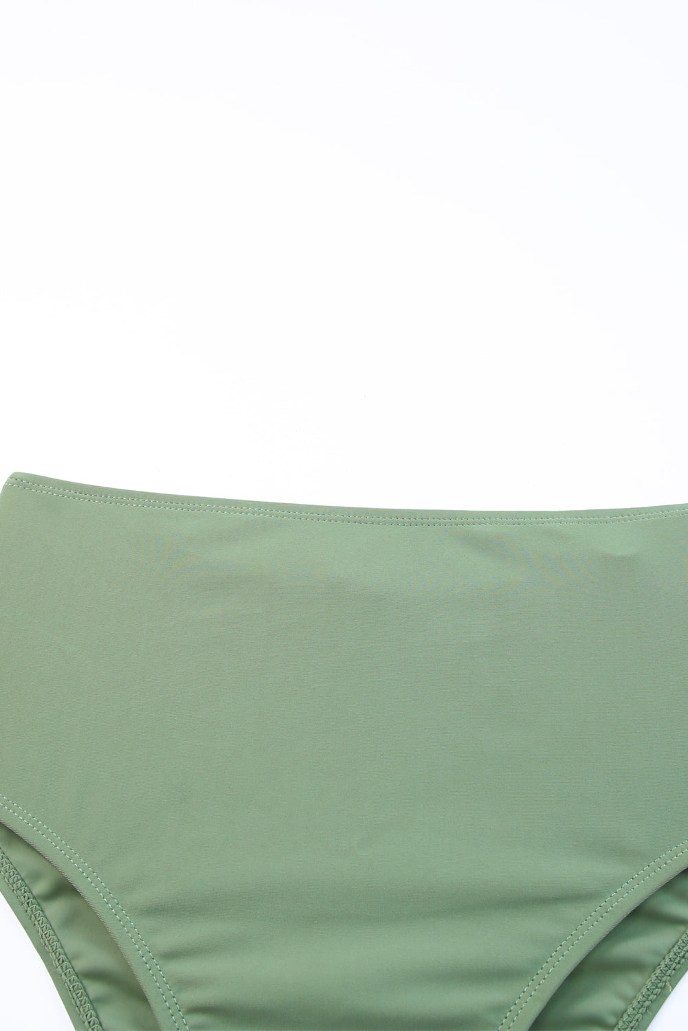 Sage ruched bodice halter swim dress detail showing high waist and stitching