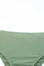 Sage ruched bodice halter swim dress detail showing high waist and stitching