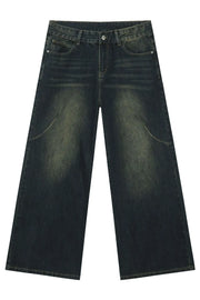 Faded wash palazzo jeans in dark denim with a wide leg and distressed details.