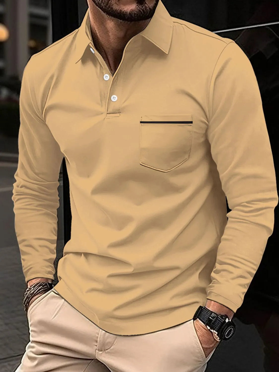 Khaki long-sleeve polo shirt with a chest pocket featuring a black trim detail.