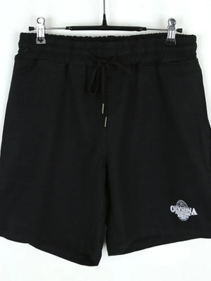 Black jersey shorts with drawstring waist and Olympia logo detail.