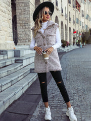 Teddy sherpa utility vest in mocha with button front and chest pockets.