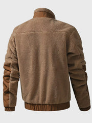 Brown sherpa fleece zip-up jacket with contrast sleeves and collar.