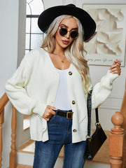 Chunky knit white button-down cardigan with V-neck and acrylic material.