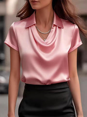Pink satin cowl neck shirt with short sleeves and a collared neckline.