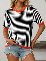 Retro stripe knit tee with contrast trim in black and white, featuring orange trim.
