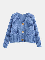 Chunky knit V-neck cardigan in light blue with statement buttons and patch pockets.