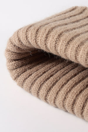 Beige ribbed acrylic beanie with a soft texture.