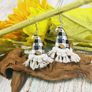 Gnome hat macrame drop earrings with black and white buffalo plaid and snowflake detail.
