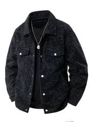 Black corduroy jacket with leaf pattern, button front, and chest pockets.