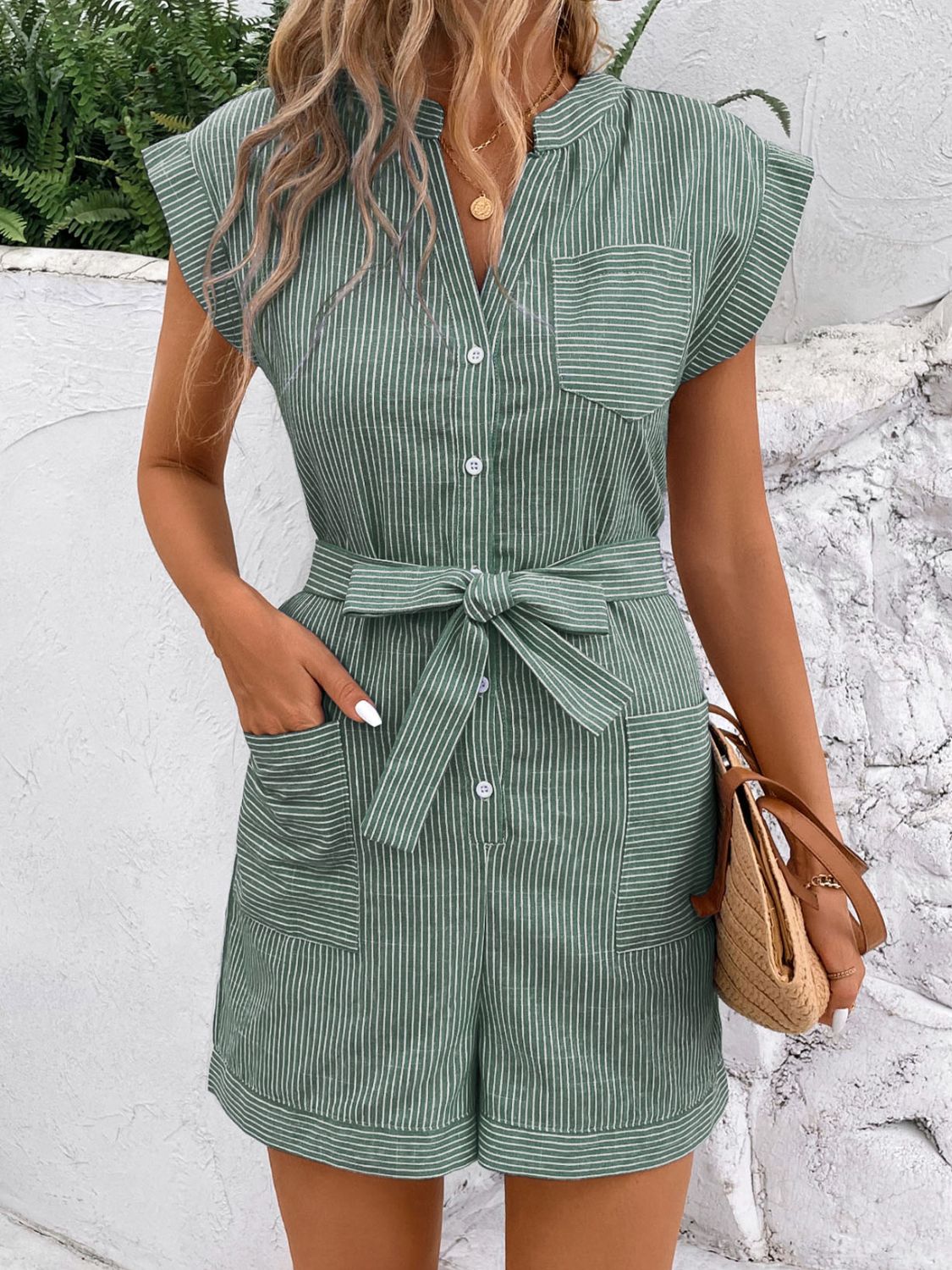 Gum Leaf striped shirting romper with tie waist and button front.