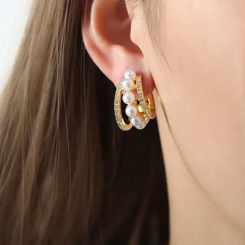 Gold double hoop earrings with pearls and pave crystal accents