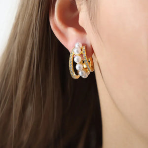 Gold double hoop earrings with pearls and pave crystal accents