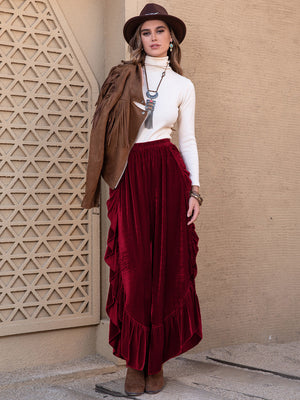Burgundy velvet ruffle slit palazzo pants with a high waist.