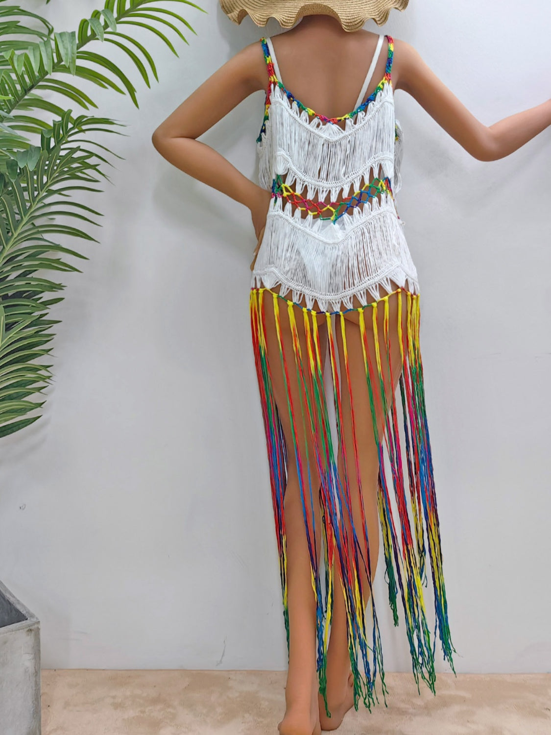 White crochet cover-up dress with rainbow fringe and straps, acrylic material.