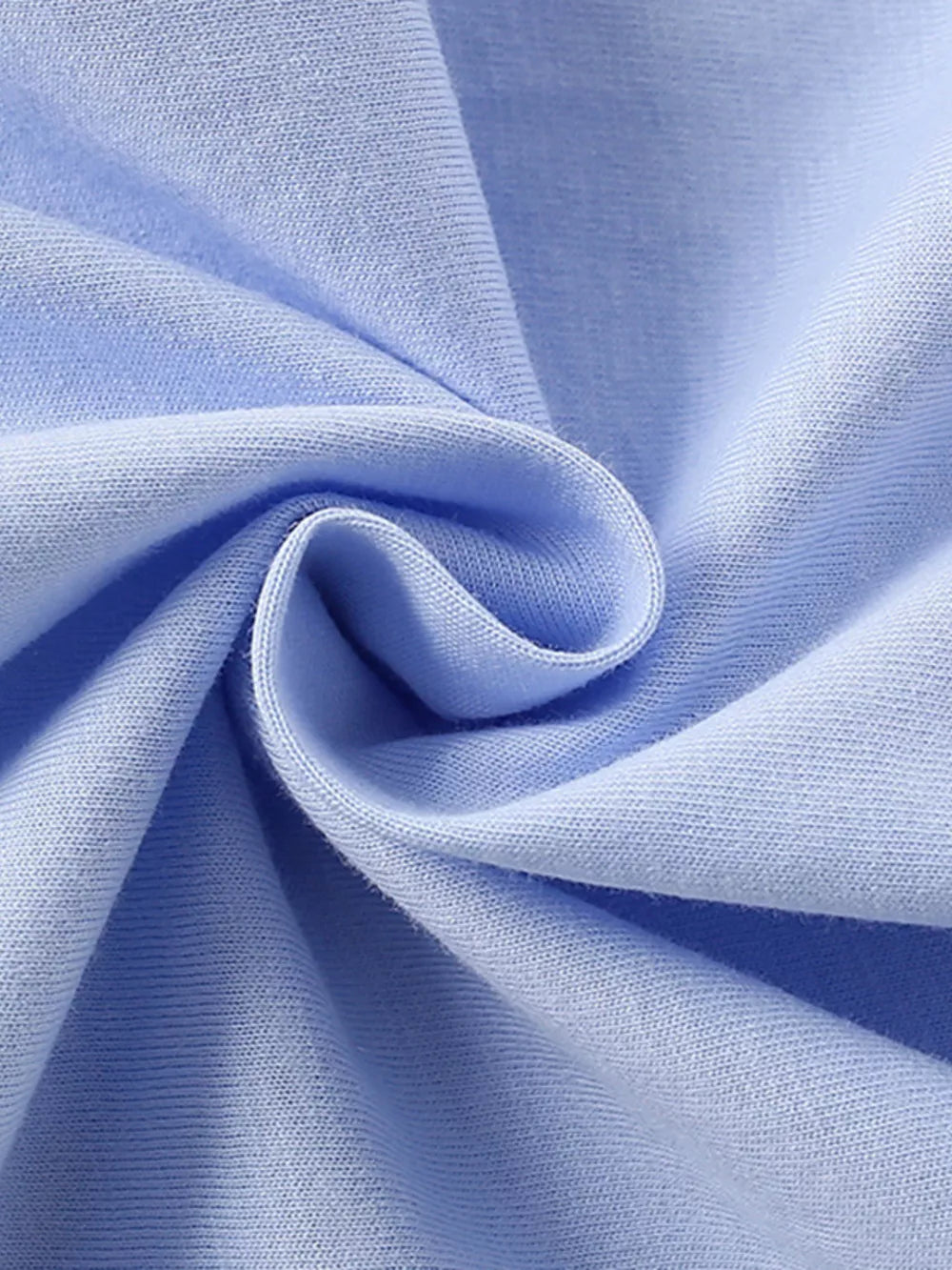 Light blue cotton blend fabric detail with soft texture and subtle ribbing.