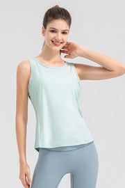 Light green performance tank top with round neck and curved back panel detail.