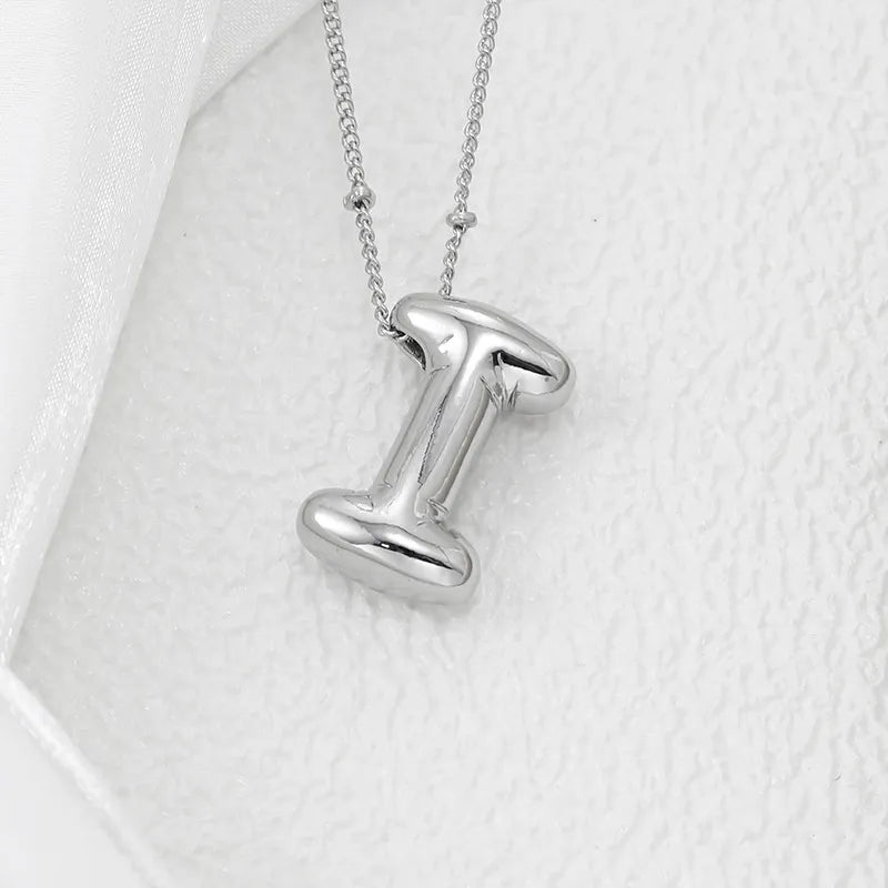 Silver initial I pendant necklace with beaded chain