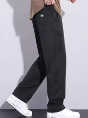 Men's black relaxed fit sweatpants with drawstring and visible stitching detail.
