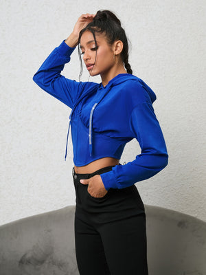 Royal blue cropped hoodie with corset detail and rhinestone trim