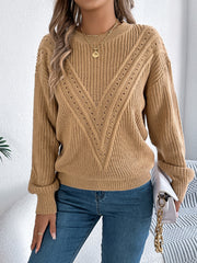 Camel chevron knit sweater with eyelet detail and crewneck.
