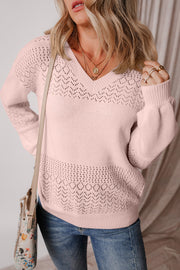 Dusty Pink perforated knit V-neck pullover sweater with openwork details and long sleeves.
