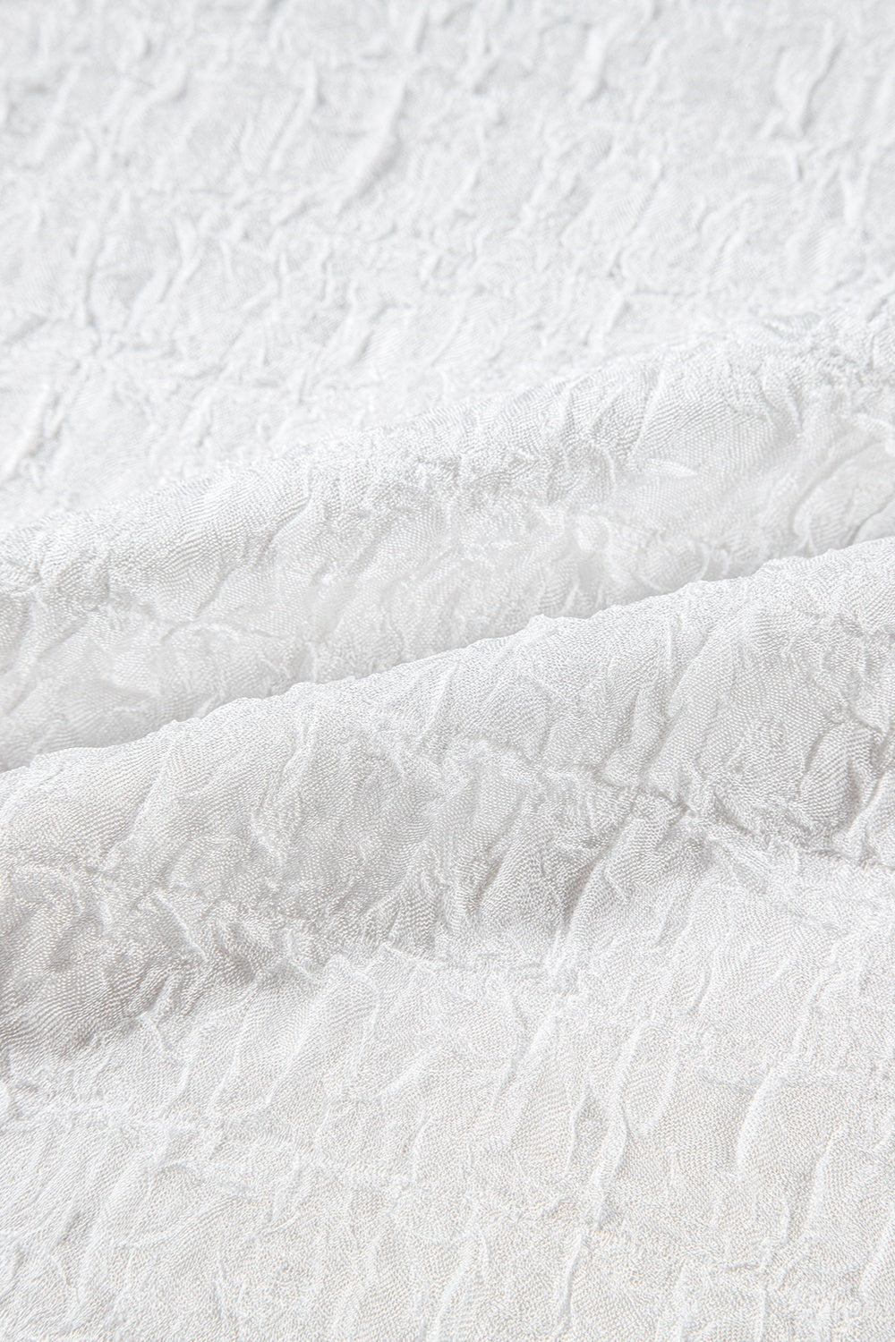 White textured blouse with crinkled fabric detail