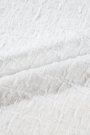 White textured blouse with crinkled fabric detail