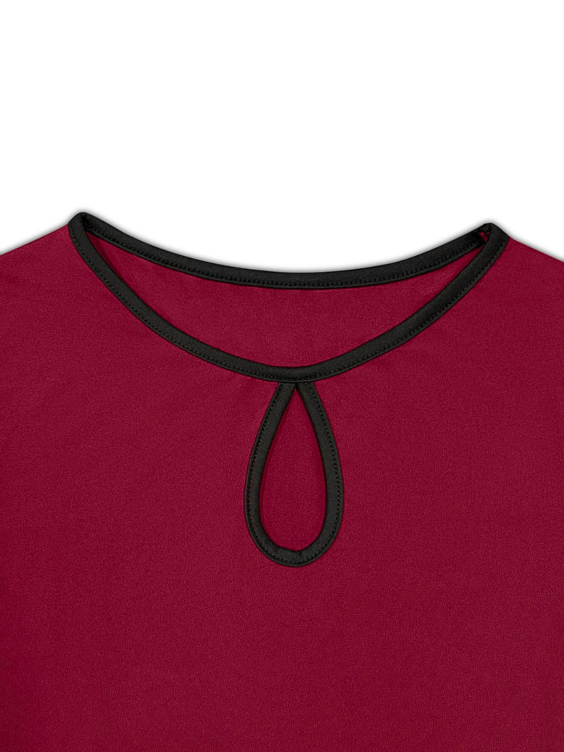 Burgundy peplum blouse with keyhole neckline and black trim.