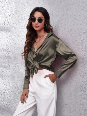 Taupe satin button-up shirt with a knotted front and collared neckline.