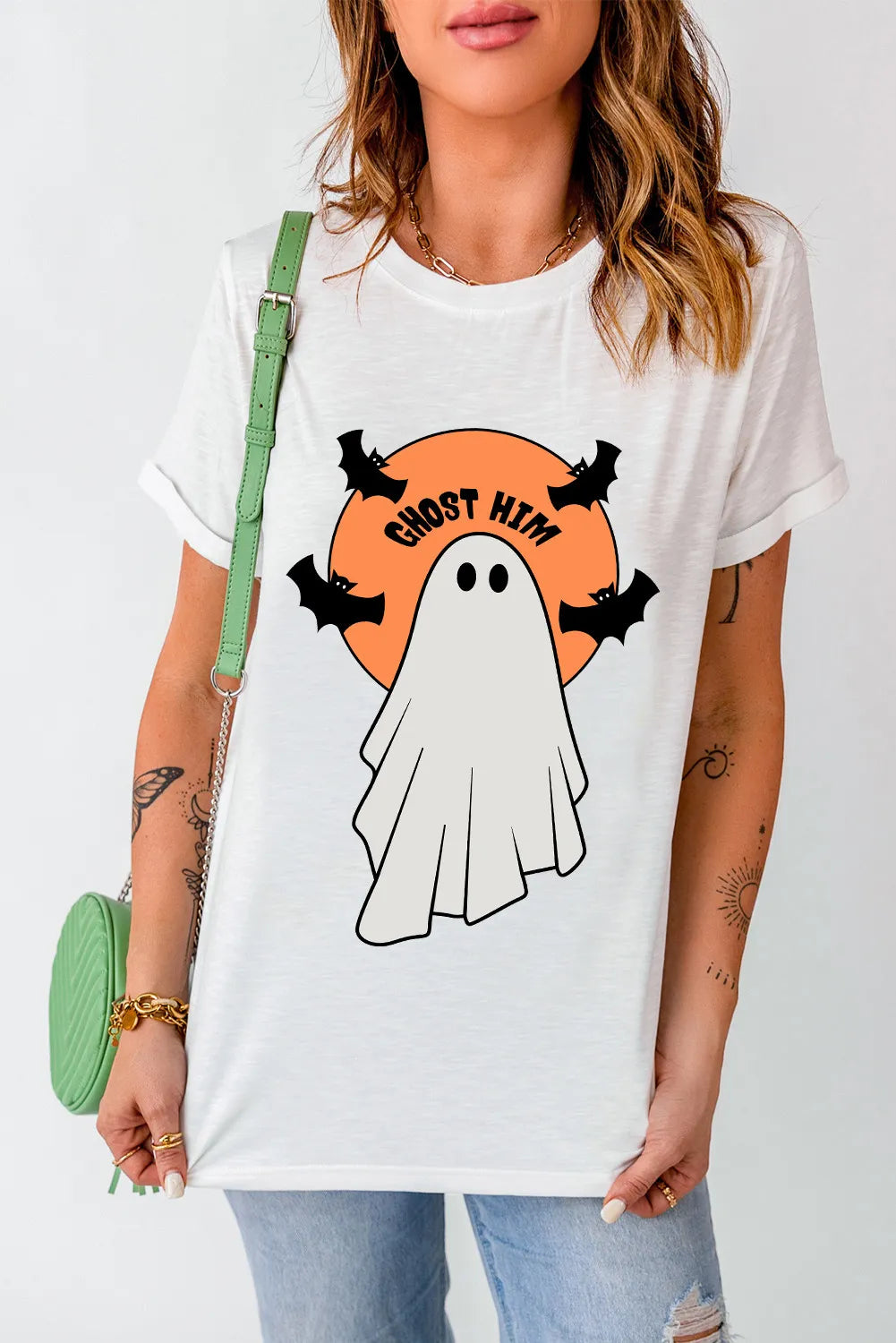 White Halloween ghost graphic tee with bats and orange moon.